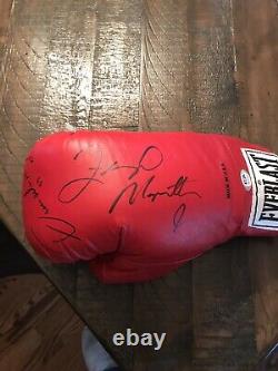 Floyd Mayweather Jr /OscarDe La Hoya autographed Boxing Glove. PSA/DNA
