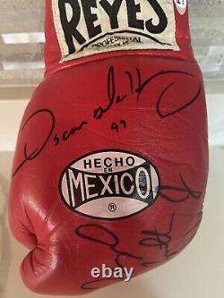 Floyd Mayweather Jr /OscarDe La Hoya autographed Professional Glove. PSA/DNA