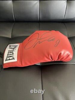 Floyd Mayweather Jr. a signé le gant de boxe Everlast rouge (Becket)