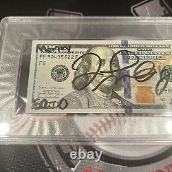 Floyd Mayweather Jr a signé un billet de 100 dollars en devise américaine avec 4 inscriptions PSA 10 Auto A.