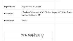 Floyd Mayweather Jr a signé une édition limitée de shorts en or Le 12 avec certificat d'authenticité Beckett.