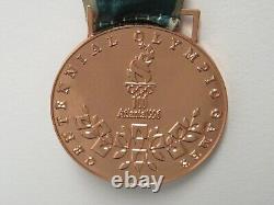 Médaille de bronze autographiée et signée par Floyd Mayweather aux Jeux Olympiques de 1996 aux États-Unis, PSA AL2.